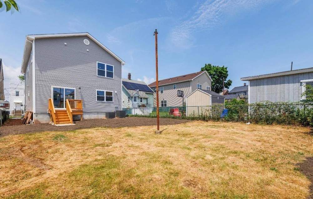 Rear — new deck and yard