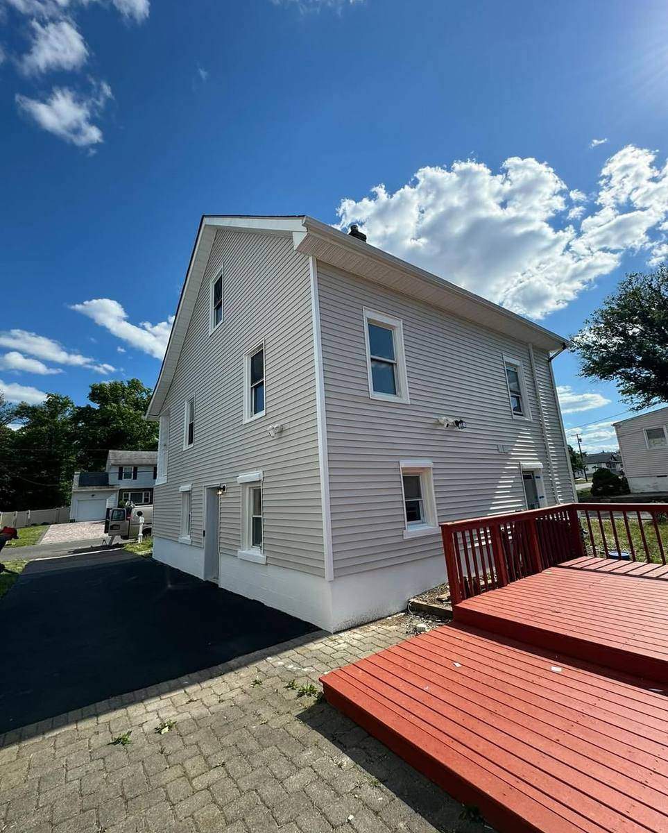 After — back siding and deck